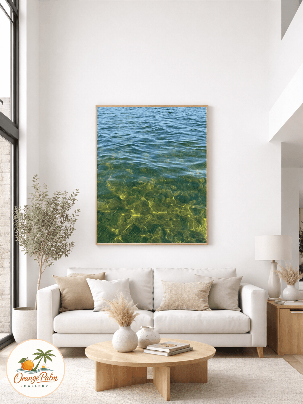 Framed Caladesi Island beach print above a coastal sofa